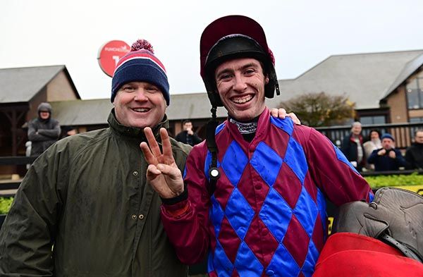 Gordon Elliott and Jack Kennedy are all smiles after completing their treble
