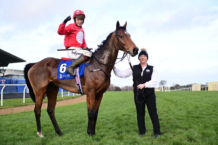 Leopardstown 28-December-2022.Home By The Lee winning jockey JJ Slevin and groom Davina Boyle.Healy Racing