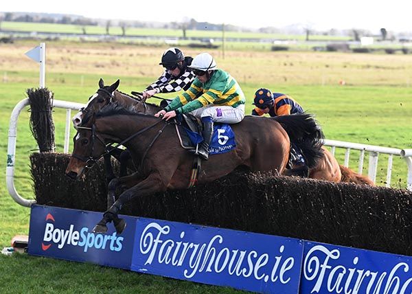 The Tack Room jumps the last just ahead of Sweet Will and Difficult Decision