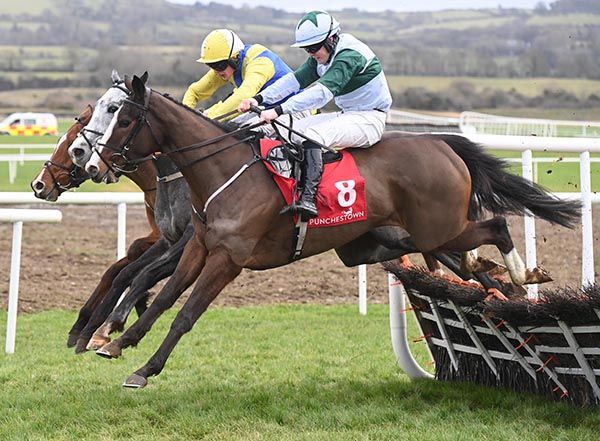 Theonewedreamof and Luke Dempsey (near side) make their challenge at the last 
