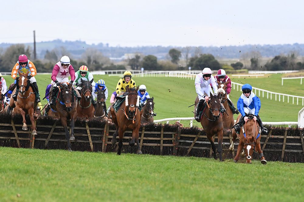 Wa Wa (second left) takes advantage as Indie Belle blunders at the last