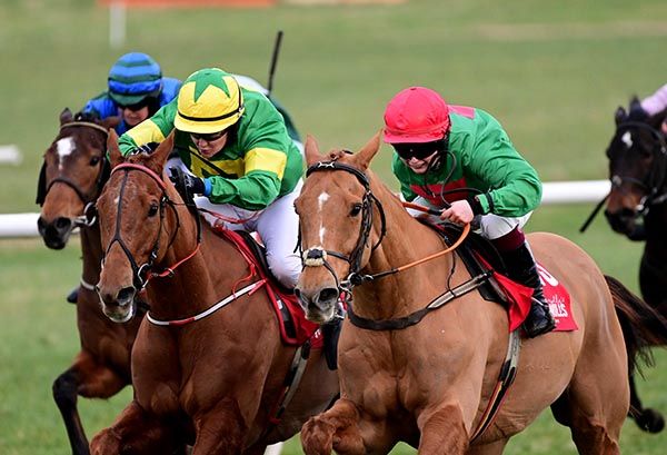 Port Rashid, red cap, passes Dylan Lombardy