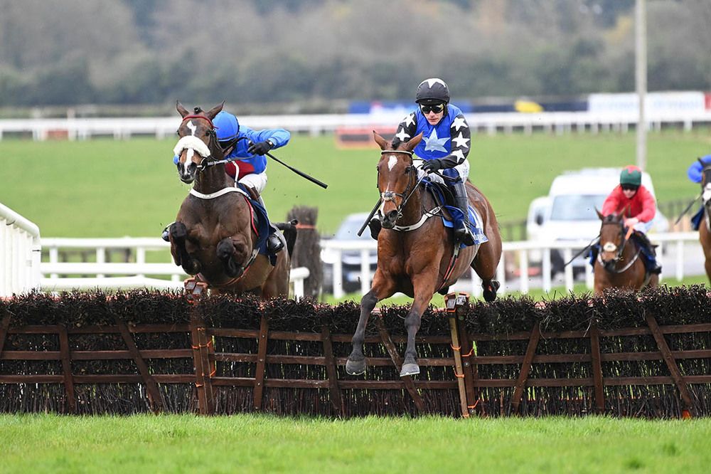 Ashroe Diamond and Paul Townend (right) clear the final hurdle from Whatcouldhavebeen 