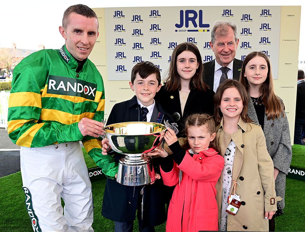 Mark Walsh and JP McManus with grand kids CJ, Cara, Milly, Lauren and Annie following Sire Du Berlais' win
