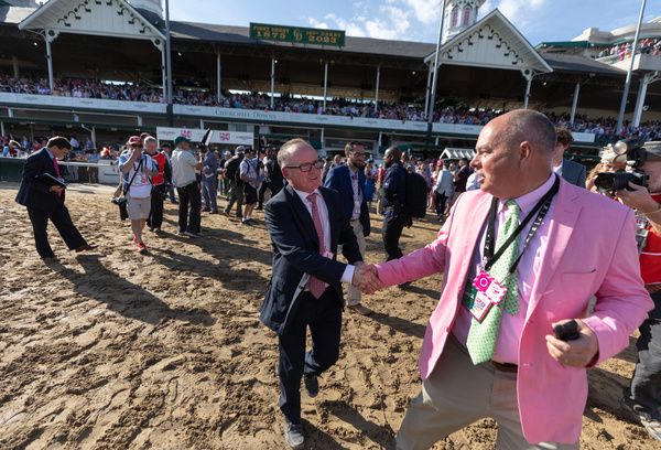 Trainer Brendan Welsh left is congratulated by Steve Hargreaves after winning the Kentucky Oaks with Pretty Mischievous