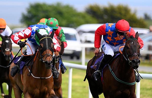 Corkbeg and Denis O'Regan (left) claim Depeche Mo 