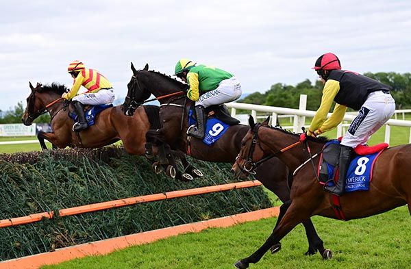 Toss Again (centre) pictured on his way to victory