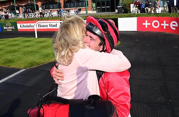 Owner Eleanora Kennedy embraces Gary Carroll after his win on Warrior Brave 