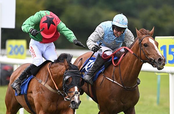 Tullyhogue Fort, right, passes Likable Chancer on the run-in