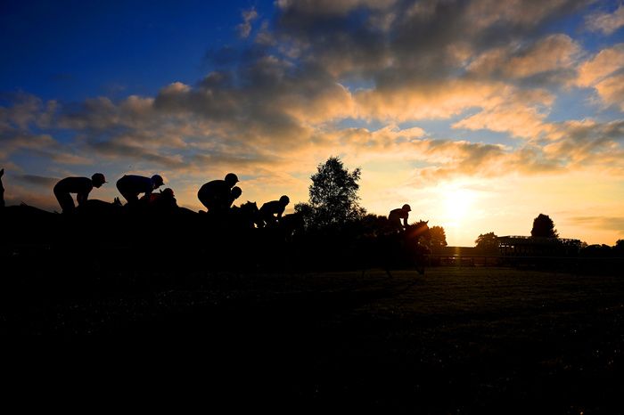Down Royal 1-September-2023.The sun is about to set as runners and riders pass by in the bumper won by Roedora.Healy Racing
