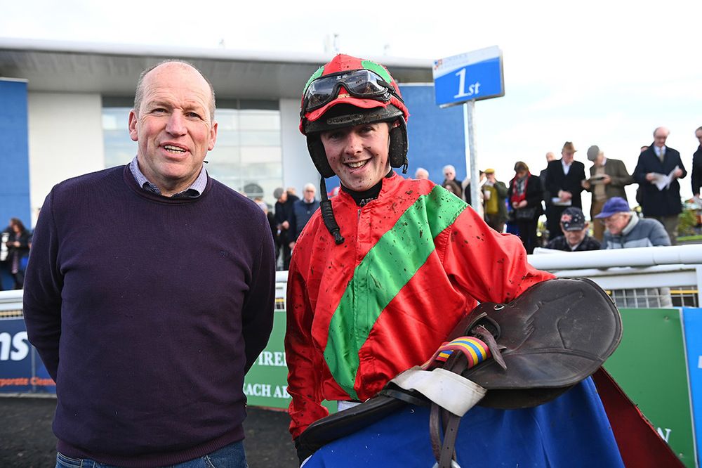 Terence O Brien with jockey John Shinnick after Answer To Kayf won in Limerick