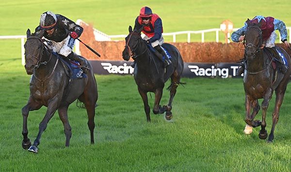 Midnight It Is, left, scores by three lengths