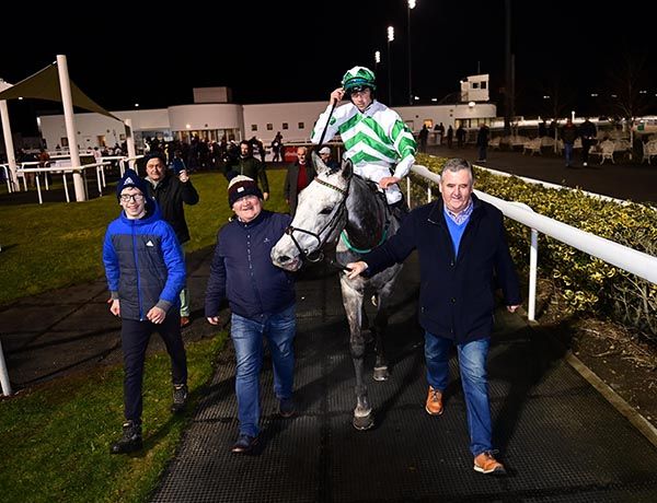 Walhaan and Scott McCullagh led back in by members of the Ask Dot Syndicate 