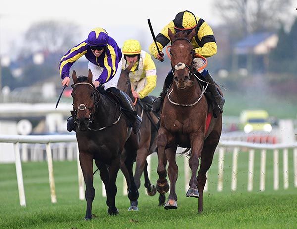Clonmeen, right, gets the measure of Cave Court