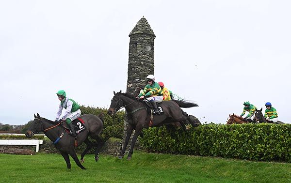 Birchdale and Simon Torrens on their way to winning the PigsBack Risk Of Thunder Steeplechase