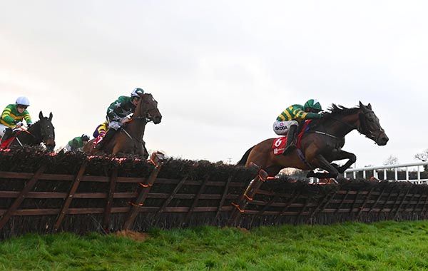 Common Practice and Mark Walsh jump the last in front