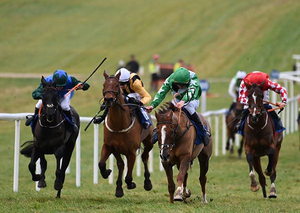 Pakens Rock and Robbie Geoghegan (centre, green
