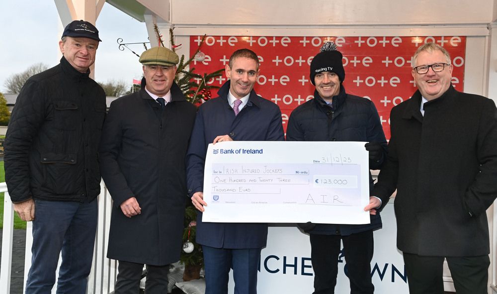 John Flannelly, Paul Hensey & Conor O'Neill (AIR) present a cheque to Ruby Walsh & Michael Higgins from IIJ.