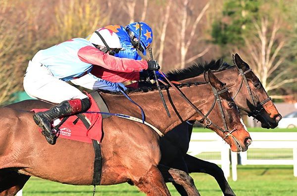 R'evelyn Pleasure, near side, battles past Baldur's Gate