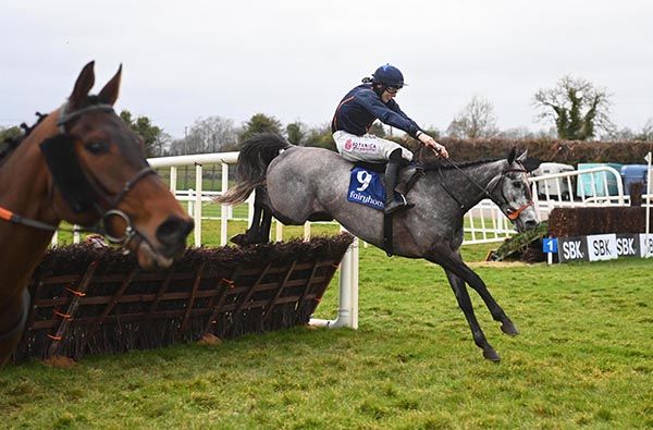 Jeriko De Baune, far side, chases down Duffys Getaway, near side