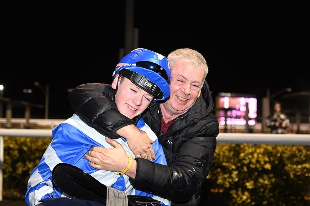 Paul Mulligan hugs son Rory following Wrecking Ball Paul's success
