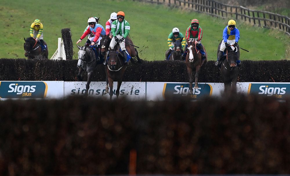 Darragh O'Keeffe (right, yellow and blue) avoided the trouble that befell his rivals to win on Hurricane Cliff