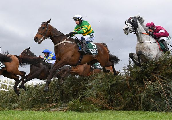 Grand National winner I Am Maximus jumping the second last fence on Saturday