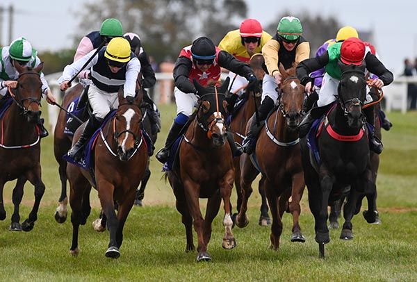 Farfromnowhere (second left, yellow cap)