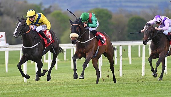 Sharinay and Ronan Whelan centre win the Welcome To Cork Racecourse Mallow Maiden from Super Sox left Healy Racing Photo