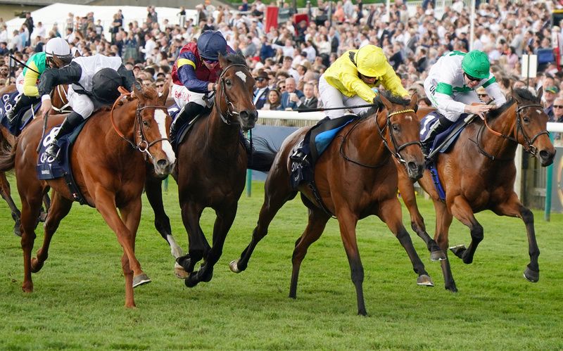 Elmalka and Silvestre De Sousa 2nd right winning The Qipco 1000 Guineas Stakes.