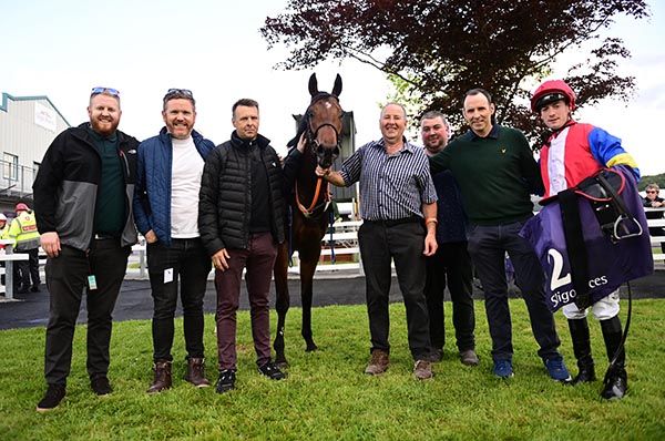 Connections of Land Lover in the winners' enclosure at Sligo after their success. 