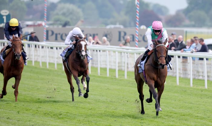 Bluestocking and Rossa Ryan (pink cap) winning The Al Basti Equworld Dubai Middleton Fillies??? Stakes York 16.5.24Healy Racing