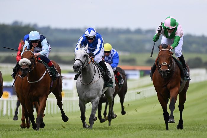 Mitbaahy (right) and Jamie Spencer winning at the Curragh
