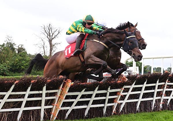 So They Tell Me jumps the last just ahead of Donkey Years