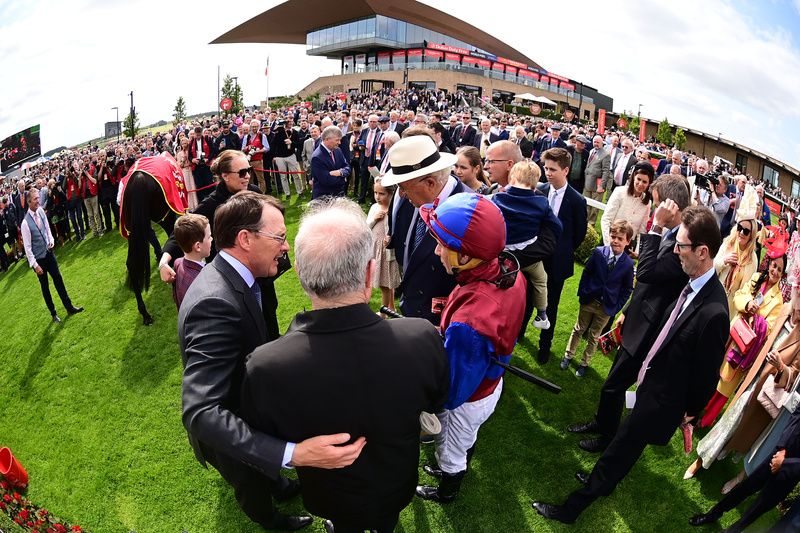 Curragh 30-June-2024 Dubai Duty Free Irish Derby.Los Angeles gave trainer Aidan O'Brien his 16th Irish Derby success pictured with connections greeting winner.Healy Racing