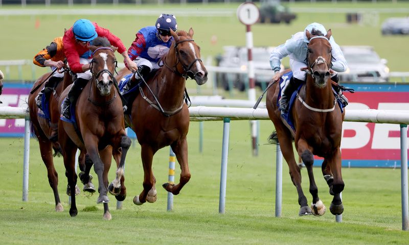 Old Cock (right) and PJ McDonald winning at Haydock