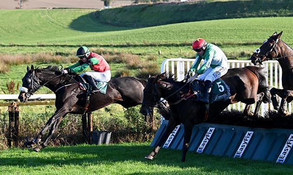 Jimli's Cave, far side, sets sail for home on the run-in 