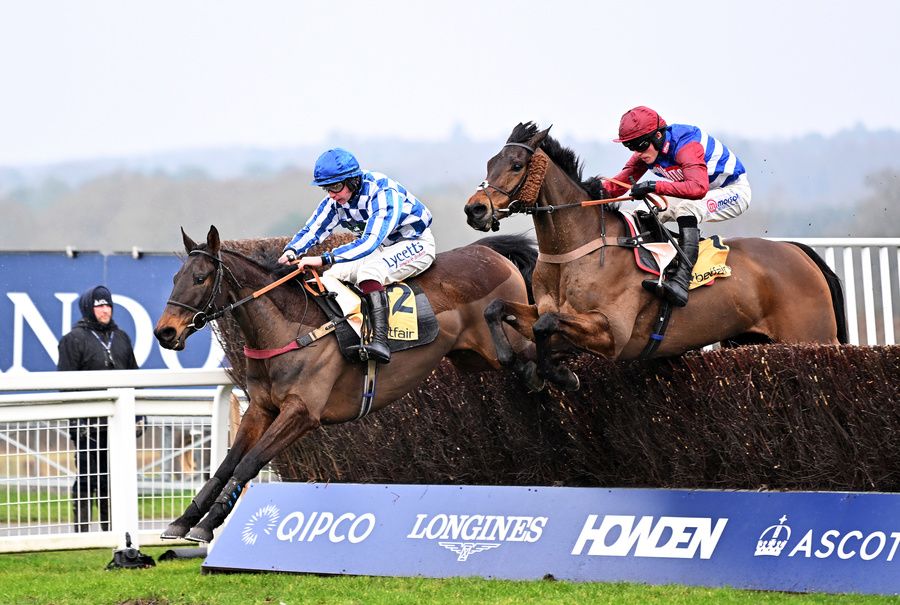 Ascot 15-February-2025Victtorino and Charlie Deutsch (left) lands over the final fence to win from Threeunderthrufive for trainer Venetia Williams.Healy Racing