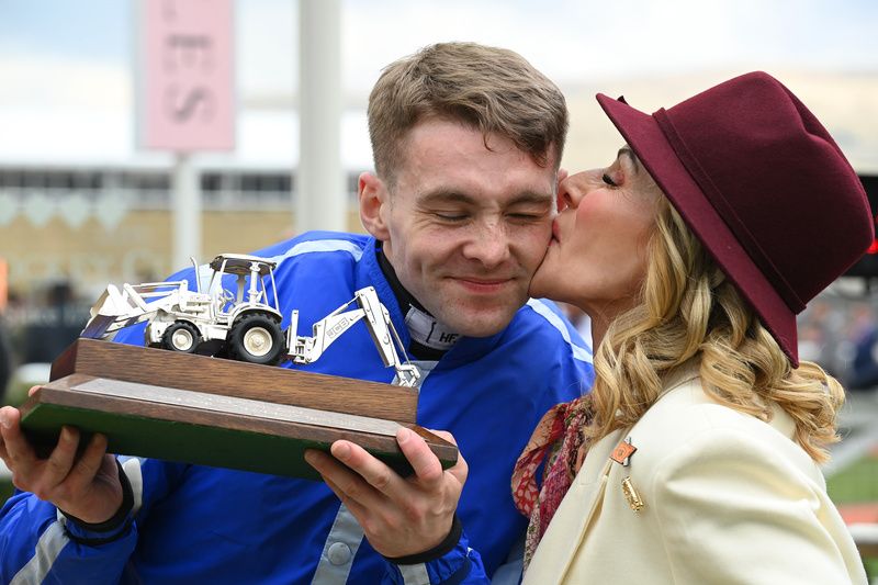 Jonjo O'Neill Jr gets a kiss from Mom Jaqui after his win aboard Poniros 