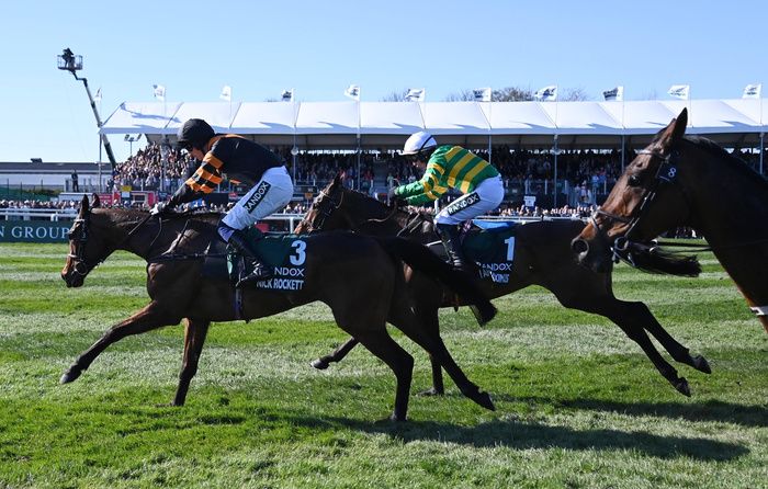 Aintree 5-4-25 Nick Rockett and Patrick Mullins (orange & black) win the Randox Grand National for owners Stewart & Sadie Andrew and trainer Willie Mullins(Healy Racing)