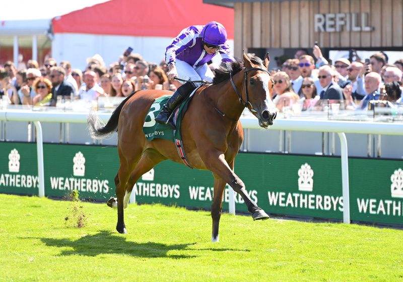 Minnie Hawk and Ryan Moore ( purple)on the way to winning The Weatherbys ePassport Cheshire Oaks (Listed Race)Healy RacingChester 07.05.2025