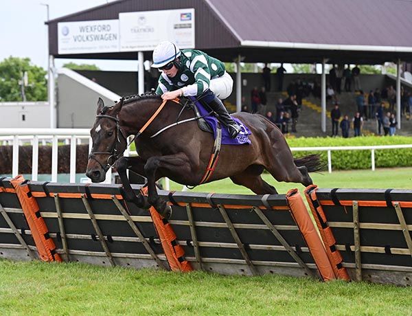 Avalo and Jake Coen clear the last