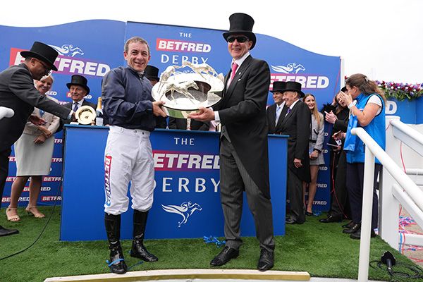 A delighted Wayne Lordan and Aidan O'Brien with the Derby Trophy