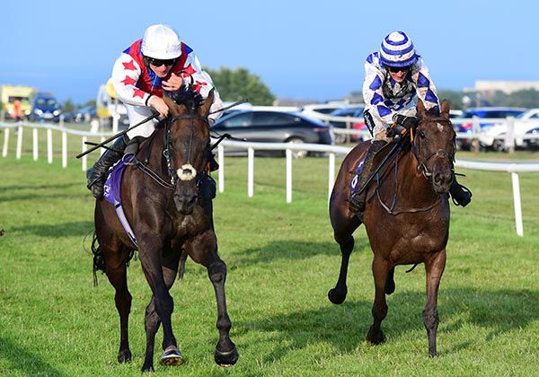 Dontdooddson, white cap, takes the honours by three-parts of a length