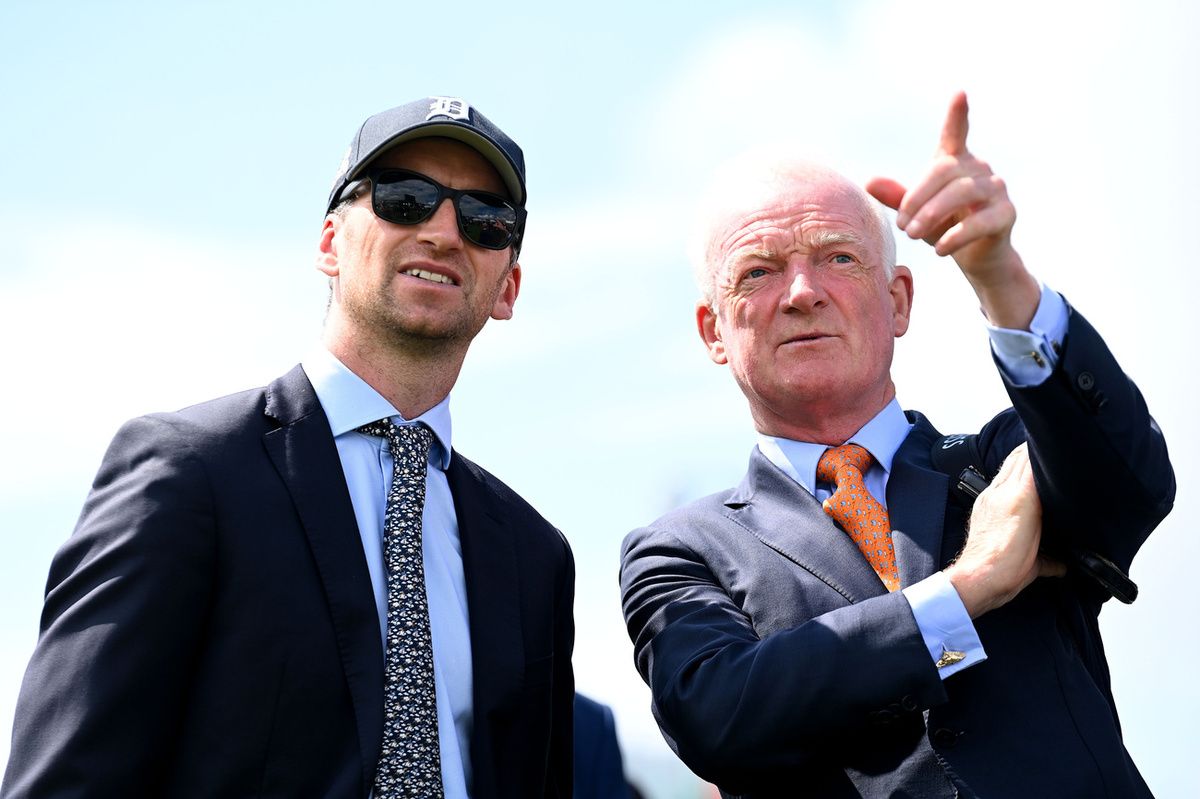 Galway 31-July-2025Trainer Willie Mullins and son Patrick watch as Gold Dancer wins for them.Healy Racing