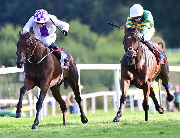 Fleetfoot, left, scores by a length and three-quarters