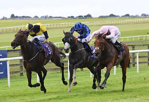 Daboya (centre) and Keithen Kennedy