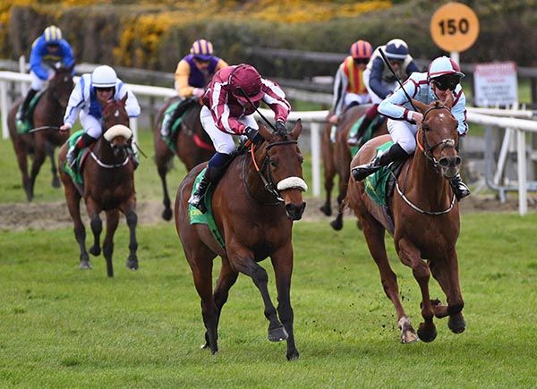 Putinapoundinthejar (left) gets the better of Superficial 