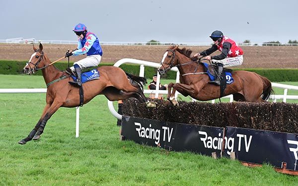 Royal Hollow and Cian Quirke (black and red) give chase to Mercury Mission 