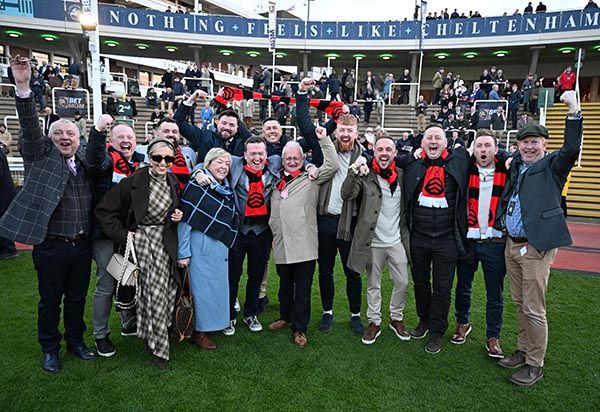 Colum (centre) celebrating the victory of The Mourne Rambler